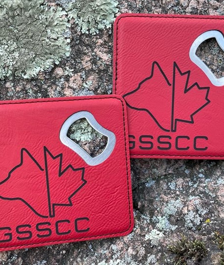 Pair of coaster engraved with the GSSCC logo
